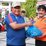 300 Paket Sembako Diserahkan untuk PWRI dalam Senam Pagi ASN Kalteng 30082025125119_1